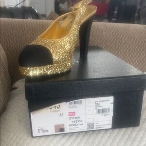 CHANEL Glittering Gold and Black Heels